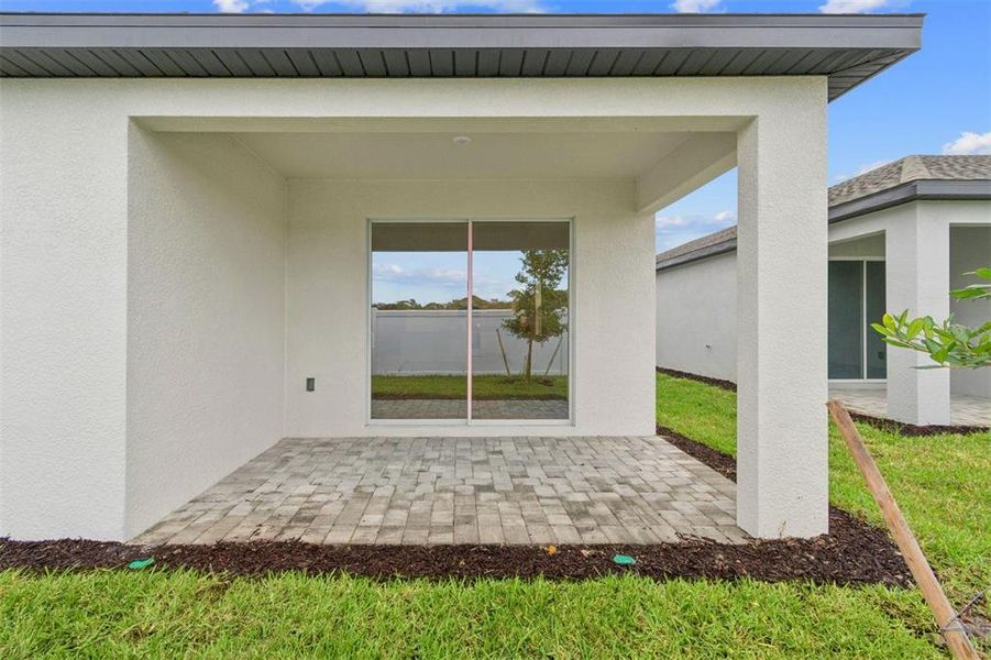 Exterior details and patio area of a home in Southpointe, Palmetto (Image 3).