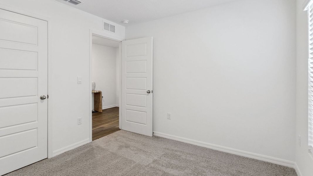 Representative unfurnished interior of a home built from the Dundee by D.R. Horton in Leoma's Landing, Lake Wales (Image 33).