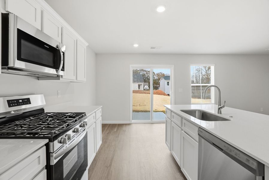 Representative furnished interior of a home built from the Spruce L by McGuinn Homes in Sibley Village, Sumter (Image 6).