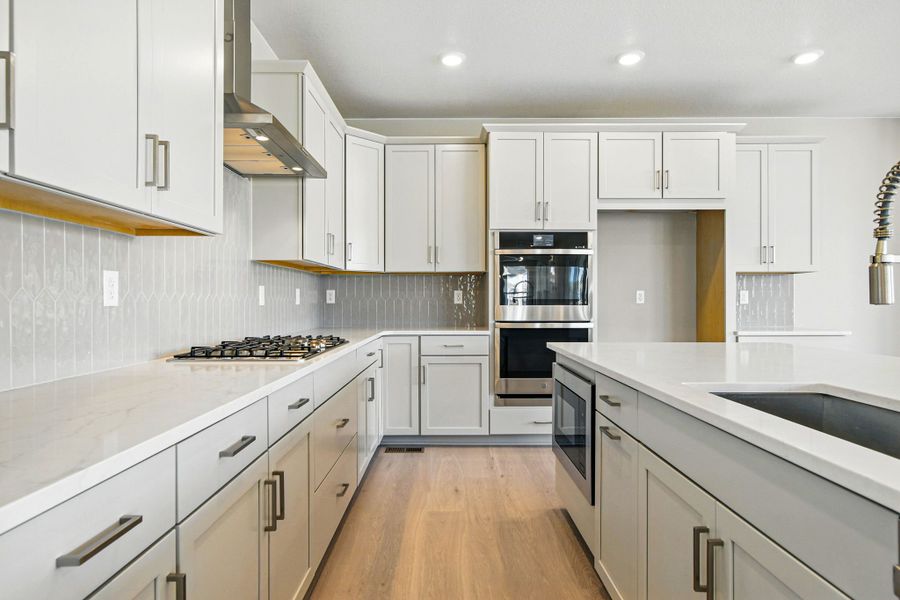 Furnished interior view inside a new home in Trailstone, Arvada (Image 14).