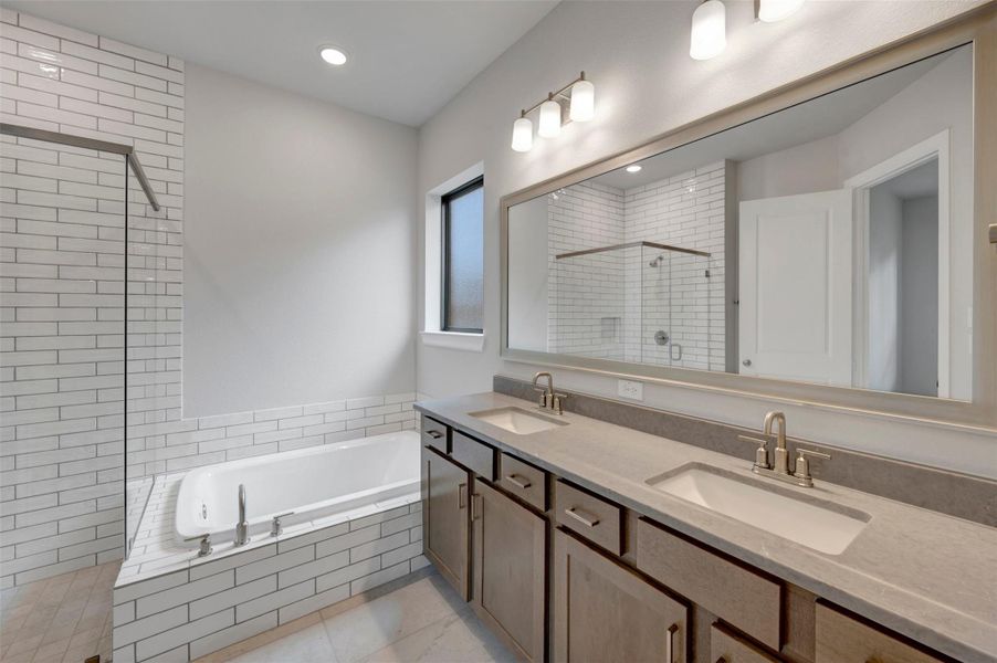 Furnished interior view inside a new home in Sienna - Landmark Row Collection, Missouri City (Image 10).