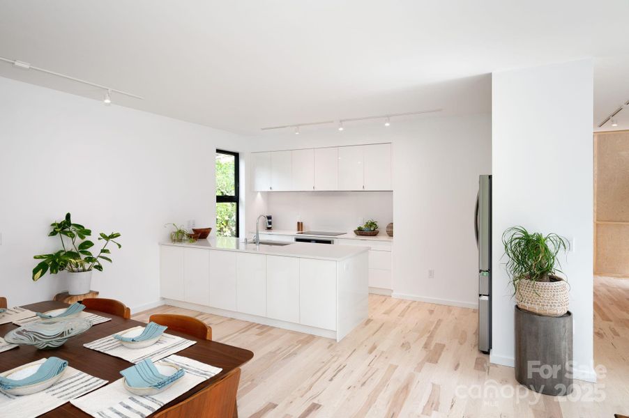 Living Area Opens to Kitchen Living Area Opens to Kitchen