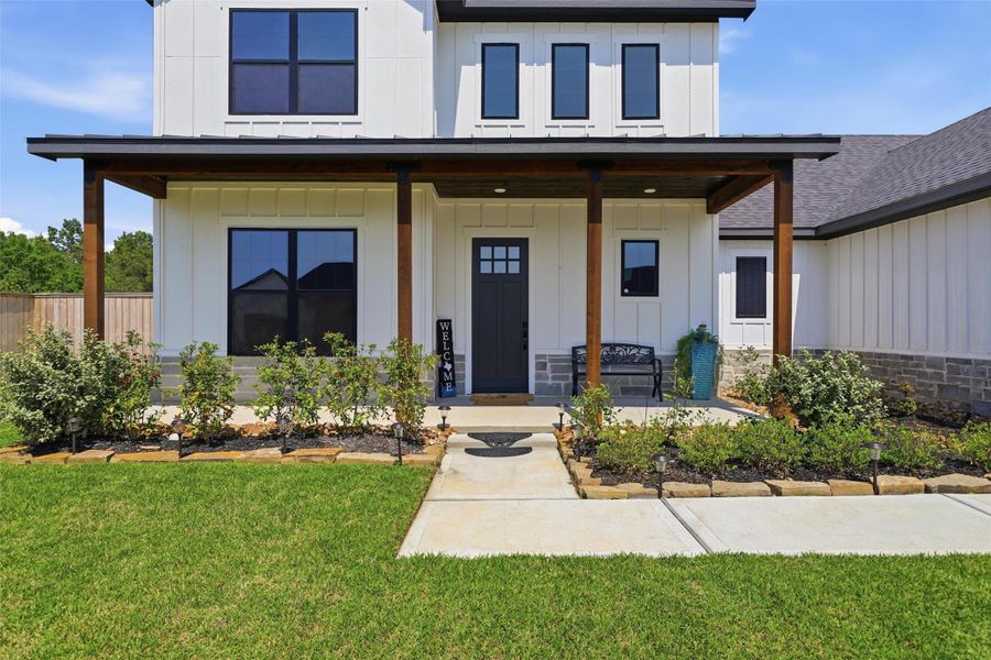 Exterior details and patio area of a home in Magnolia Woods - 70', Magnolia (Image 4).