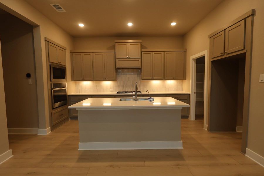 Furnished interior view inside a new home in Woodson’s Reserve, Spring (Image 5).