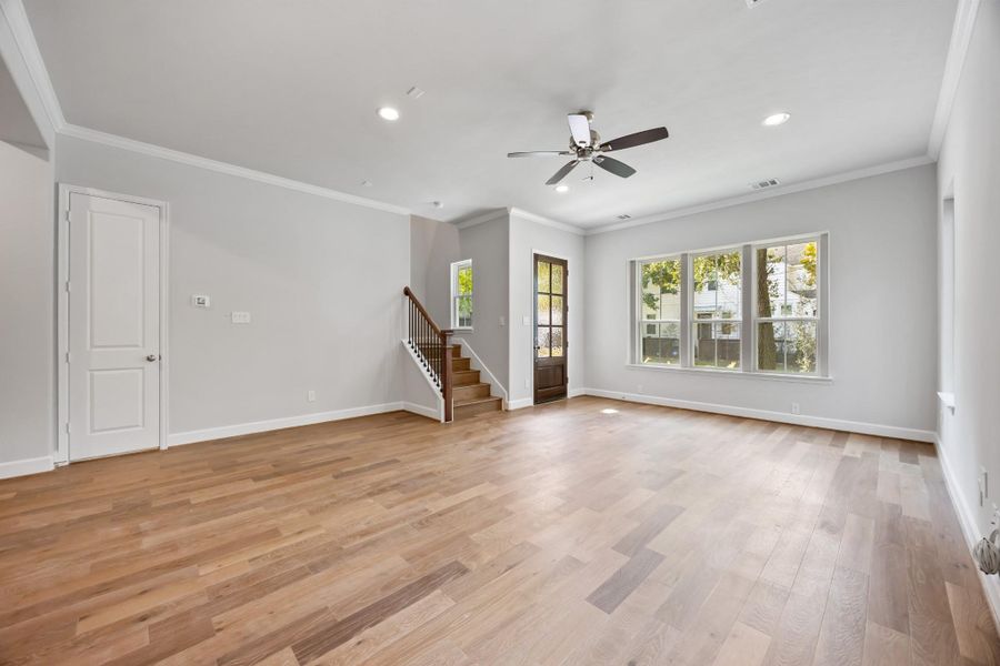 Walk through the upgraded front door and instantly feel the shift—this is home. Clean lines, sunlight, and an open vibe make this space feel like a breath of fresh air.