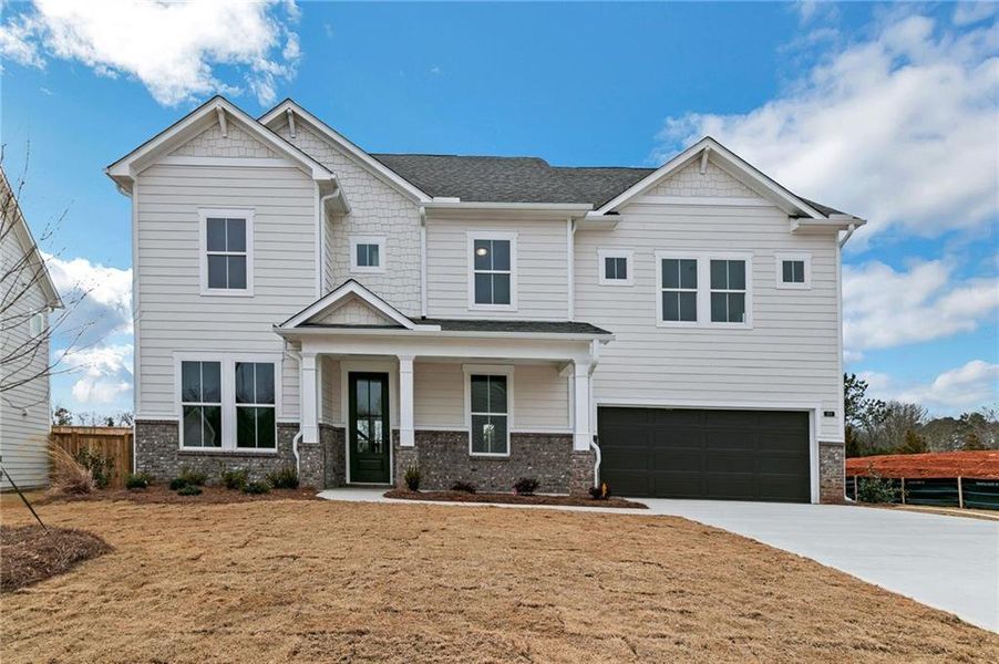 Front exterior of a new home in Austin Springs, Bethlehem, GA, highlighting curb appeal (Image 2). Front exterior of a new home in Austin Springs, Bethlehem, GA, highlighting curb appeal (Image 2).