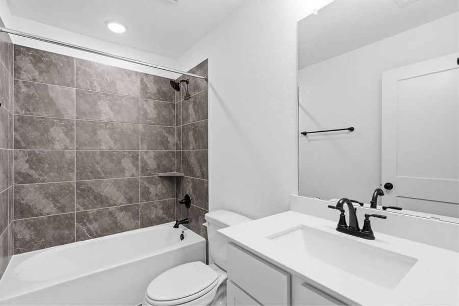 Furnished interior view inside a new home in Hunters Crossing, Sealy (Image 9).