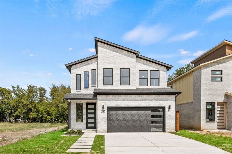 View of front of house featuring a garage