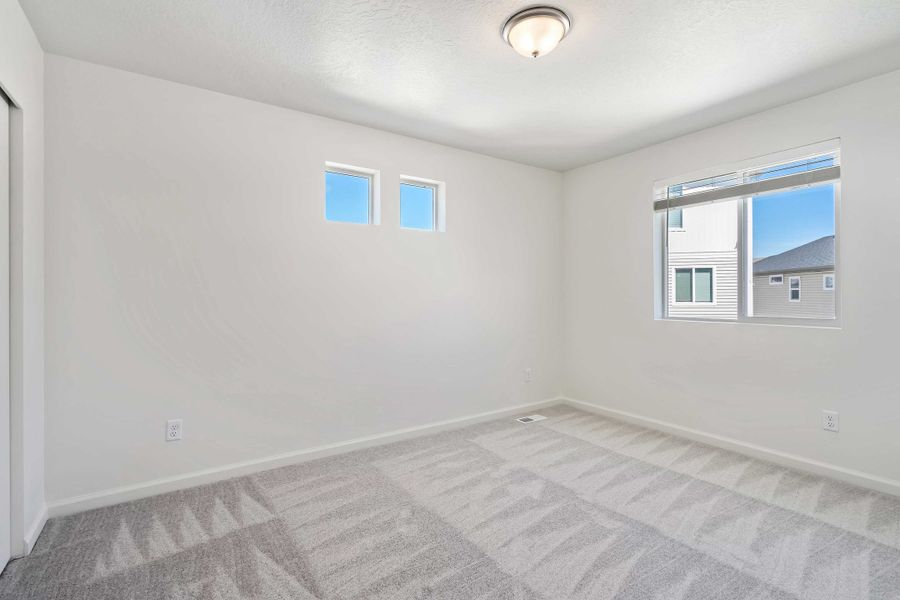 Spacious, unfurnished interior of a new home in Reunion, Commerce City (Image 22).