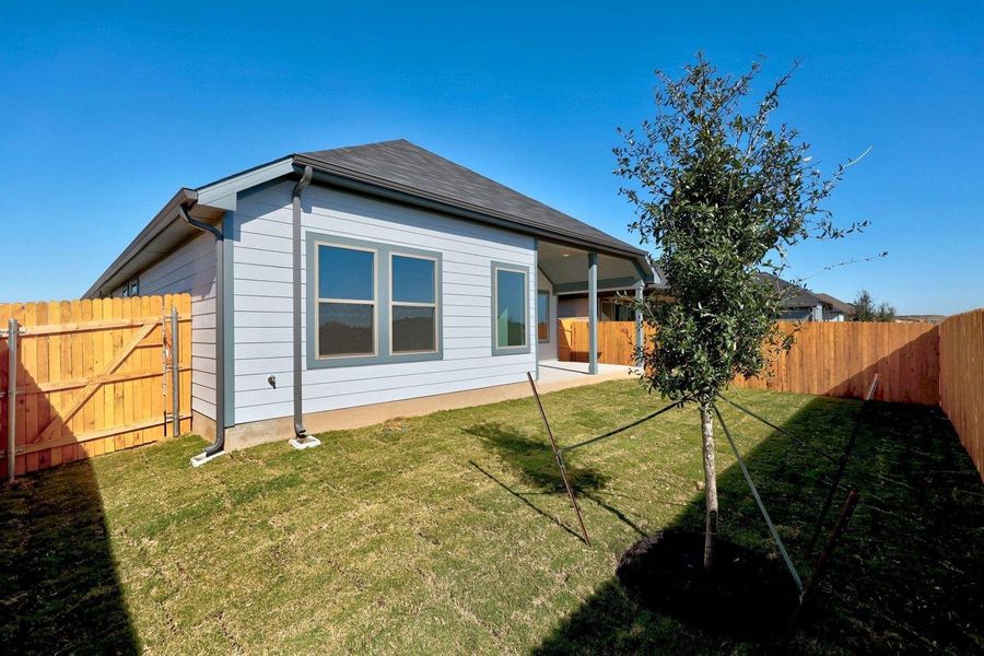 Exterior details and patio area of a home in Prairie Winds, Hutto (Image 3).