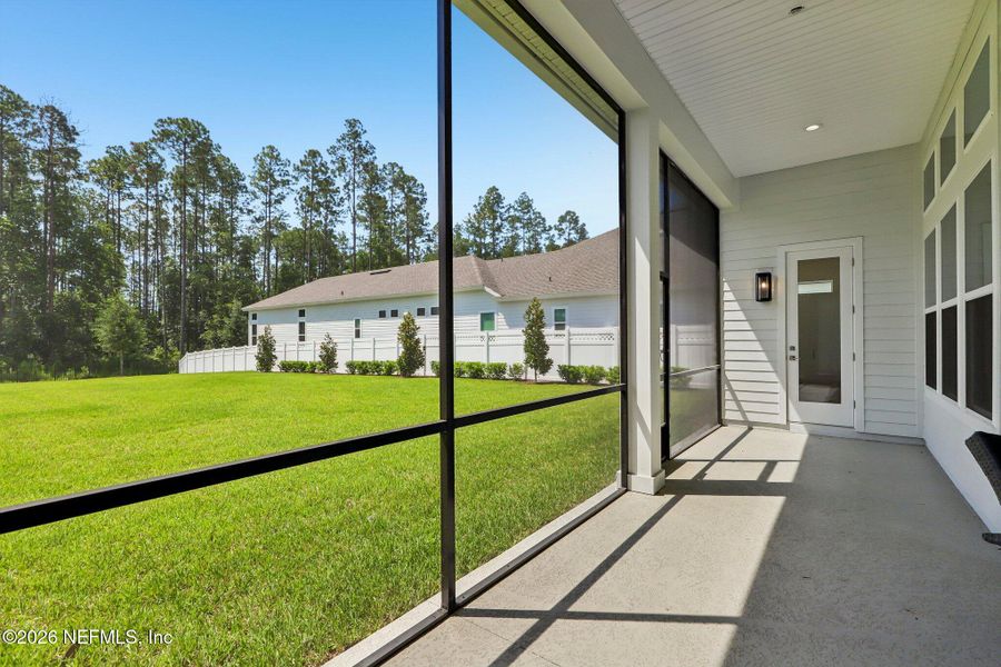Exterior details and patio area of a home in SilverLeaf, St. Augustine (Image 29).