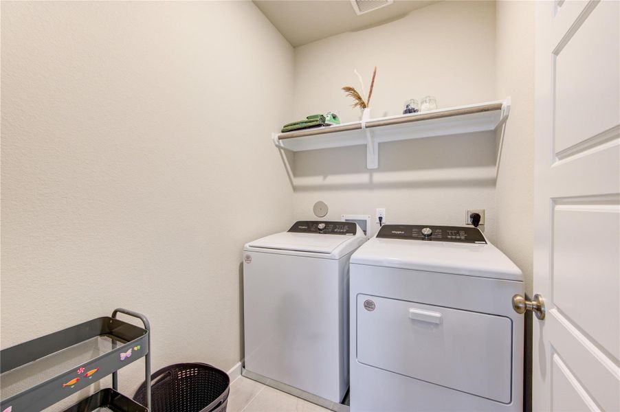 laundry room with washer and gas dryer included laundry room with washer and gas dryer included