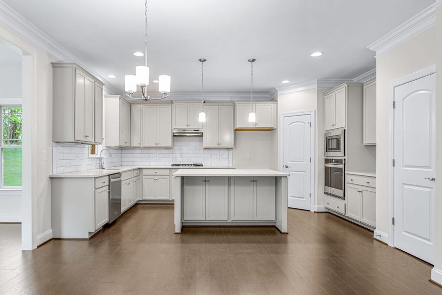 Representative furnished interior of a home built from the Kendall Lux by Keystone Homes NC in Weybridge, Burlington (Image 7).