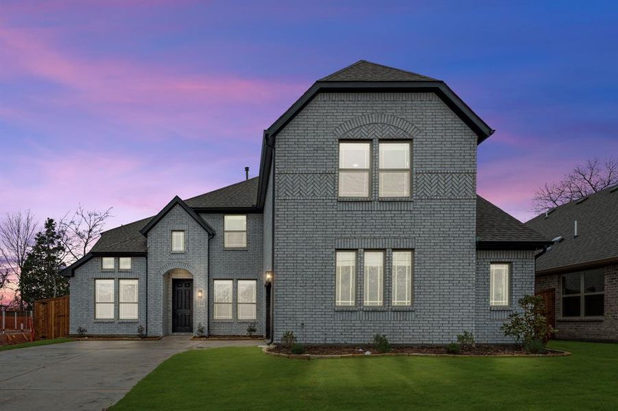 Front exterior of a new home in East Oak Creek 60-65, Commerce, TX, highlighting curb appeal (Image 21). Front exterior of a new home in East Oak Creek 60-65, Commerce, TX, highlighting curb appeal (Image 21).