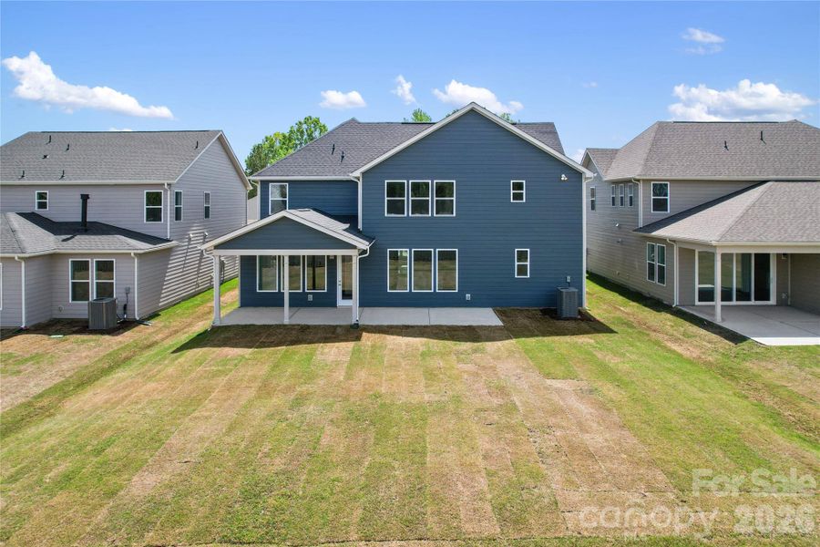 Exterior details and patio area of a home in Parkside Crossing, Charlotte (Image 27).
