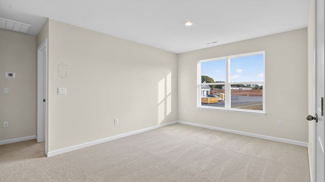 Spacious, unfurnished interior of a new home in Honeycutt Oaks, Angier (Image 20).