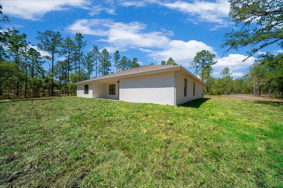 Exterior details and patio area of a home in , Ocala (Image 33).