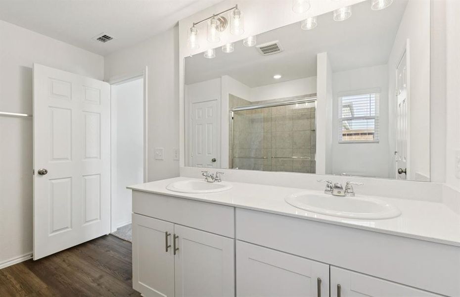 Owner's private bathroom with double vanity Owner's private bathroom with double vanity