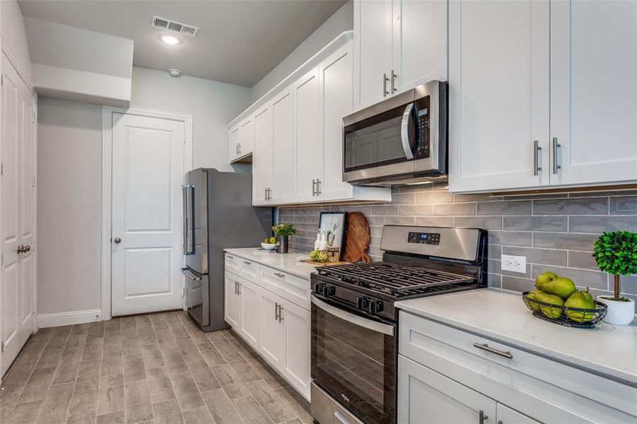 Furnished interior view inside a new home in , Lewisville (Image 16). Furnished interior view inside a new home in , Lewisville (Image 16).