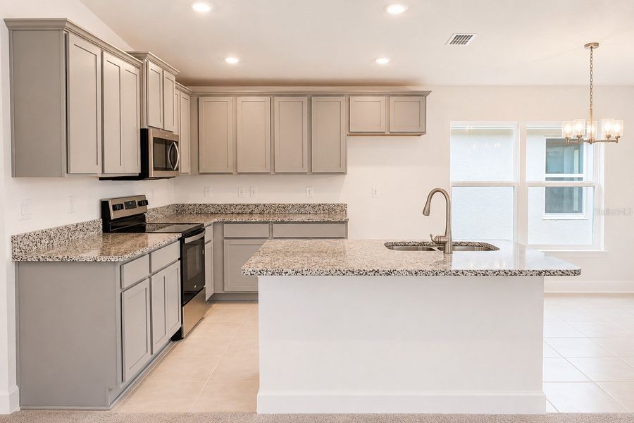 Furnished interior view inside a new home in Harmony Central, St. Cloud (Image 8).