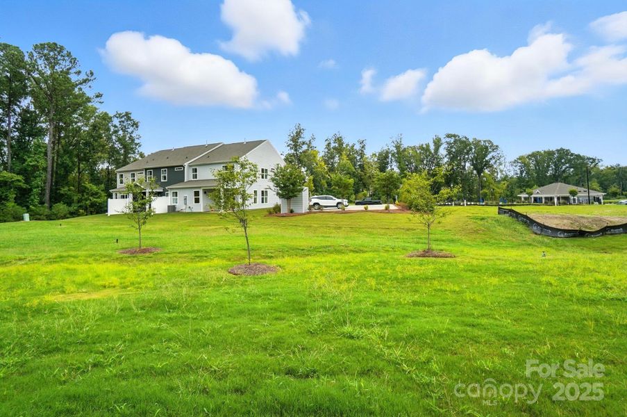 Front exterior of a new home in Harrisburg Village, Harrisburg, NC, highlighting curb appeal (Image 24). Front exterior of a new home in Harrisburg Village, Harrisburg, NC, highlighting curb appeal (Image 24).