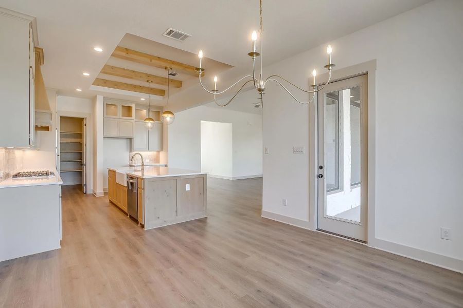 Representative furnished interior of a home built from the The Carley by Elmwood Custom Homes in Matthews Farm, Venus (Image 31).