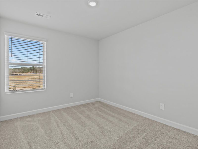 Spacious, unfurnished interior of a new home in Northbrook Village Townes, Taylors (Image 15).