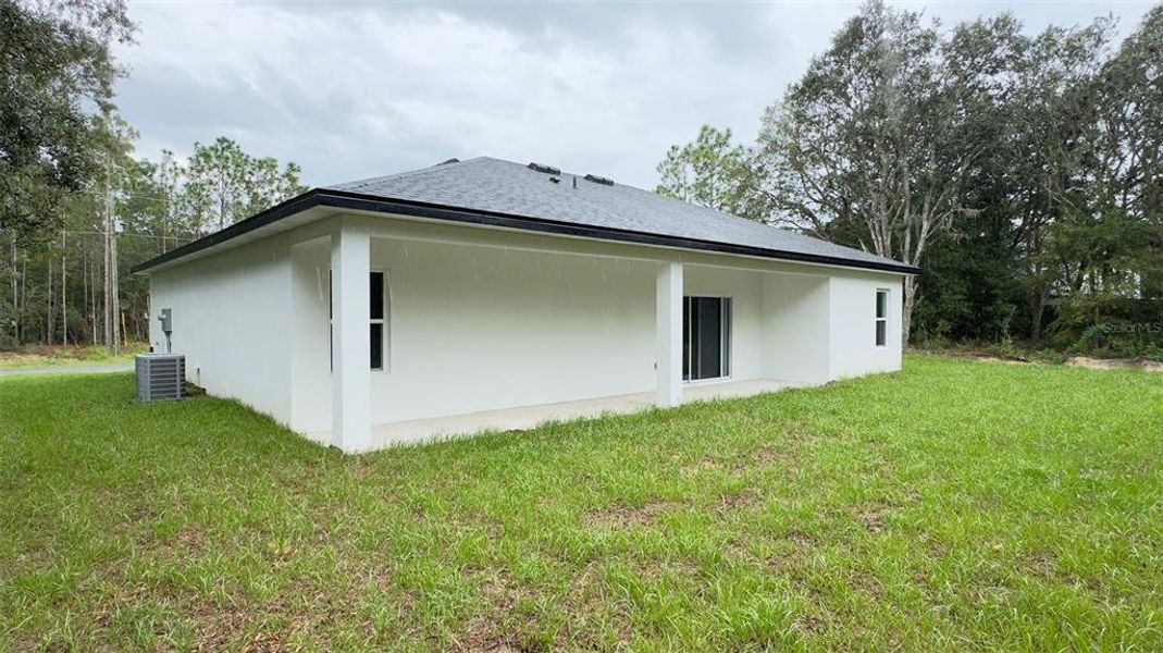 Front exterior of a new home in , Citrus Springs, FL, highlighting curb appeal (Image 19).