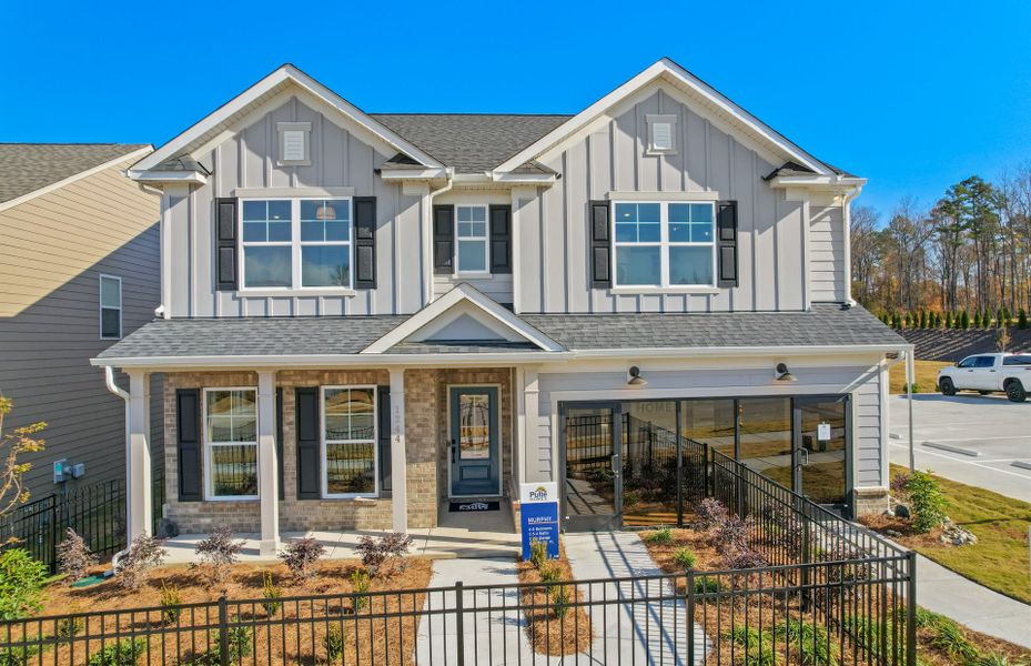 Front exterior of a new home in Cannon Run, Concord, NC, highlighting curb appeal (Image 23). Front exterior of a new home in Cannon Run, Concord, NC, highlighting curb appeal (Image 23).