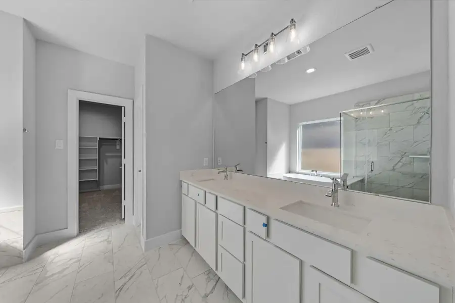 Furnished interior view inside a new home in Barton Creek Ranch, Conroe (Image 7).