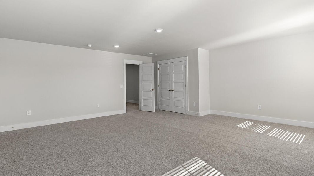 Spacious, unfurnished interior of a new home in Sidbury Station, Castle Hayne (Image 28).