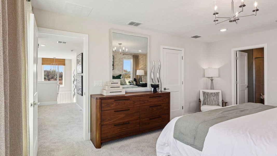 The Mangrove Model Primary Suite at Lakeside at Satilla by DRB Homes in Saint Cloud, FL