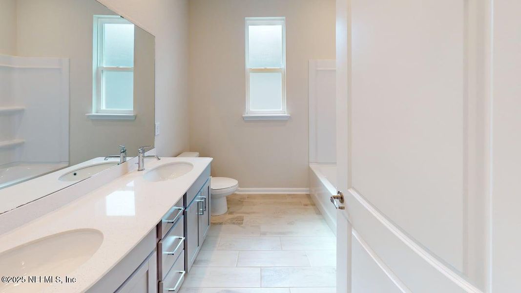 Furnished interior view inside a new home in Lakes at Bella Lago, Green Cove Springs (Image 4).