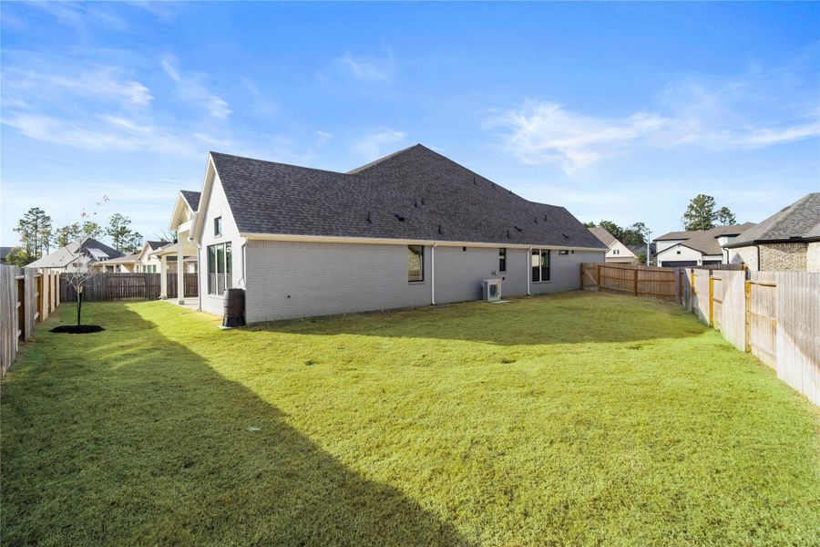 The spacious side yard is uniquely functional, providing ample room for a private dog run, a secluded garden, or convenient out-of-sight storage for larger items. The spacious side yard is uniquely functional, providing ample room for a private dog run, a secluded garden, or convenient out-of-sight storage for larger items.