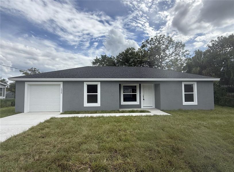 Front exterior of a new home in , Lakeland, FL, highlighting curb appeal (Image 1). Front exterior of a new home in , Lakeland, FL, highlighting curb appeal (Image 1).