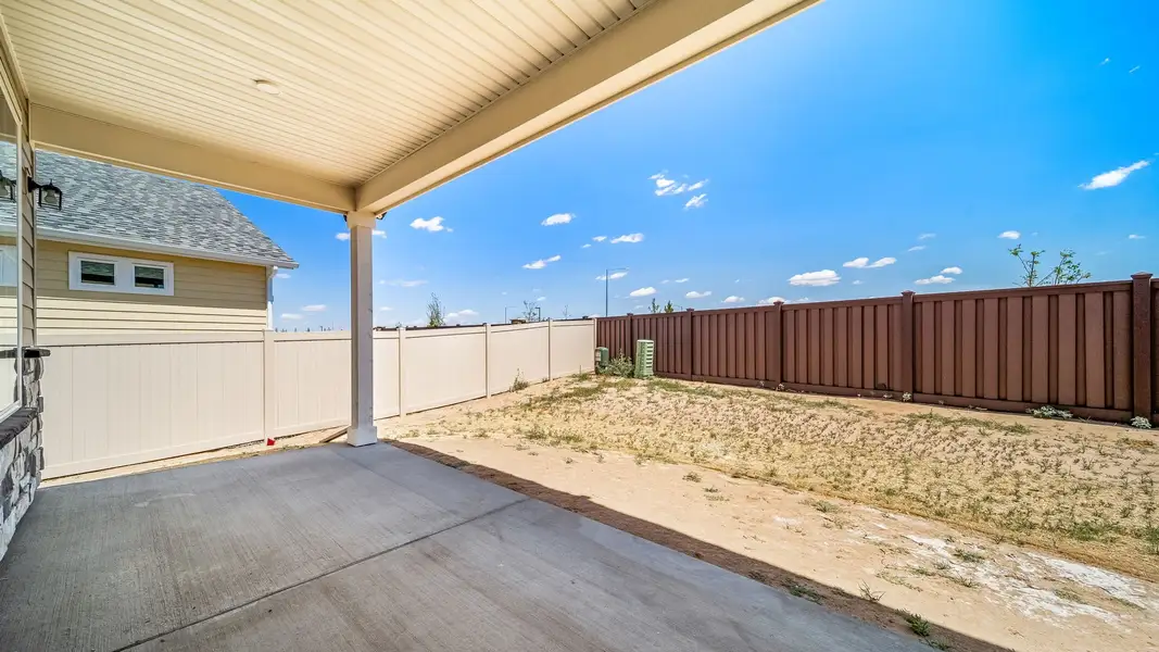 Exterior details and patio area of a home in The Reserve at Green Valley Ranch, Aurora (Image 3).