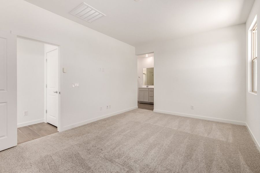 Spacious, unfurnished interior of a new home in The Villages at North Copper Canyon, Surprise (Image 9).