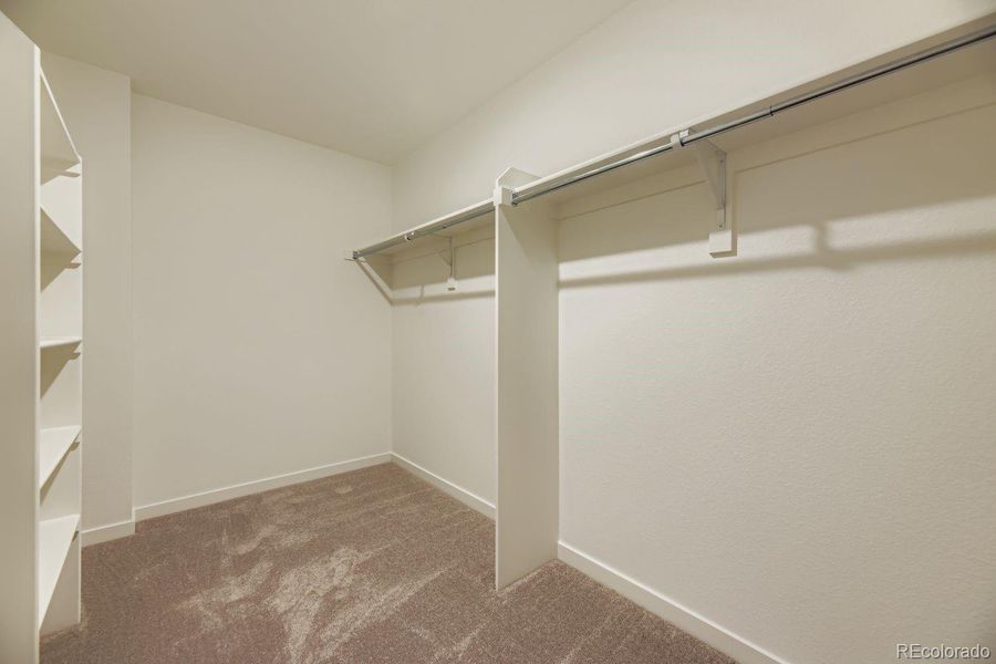 Spacious, unfurnished interior of a new home in Eastcreek Farm: The Camden Collection, Thornton (Image 12).