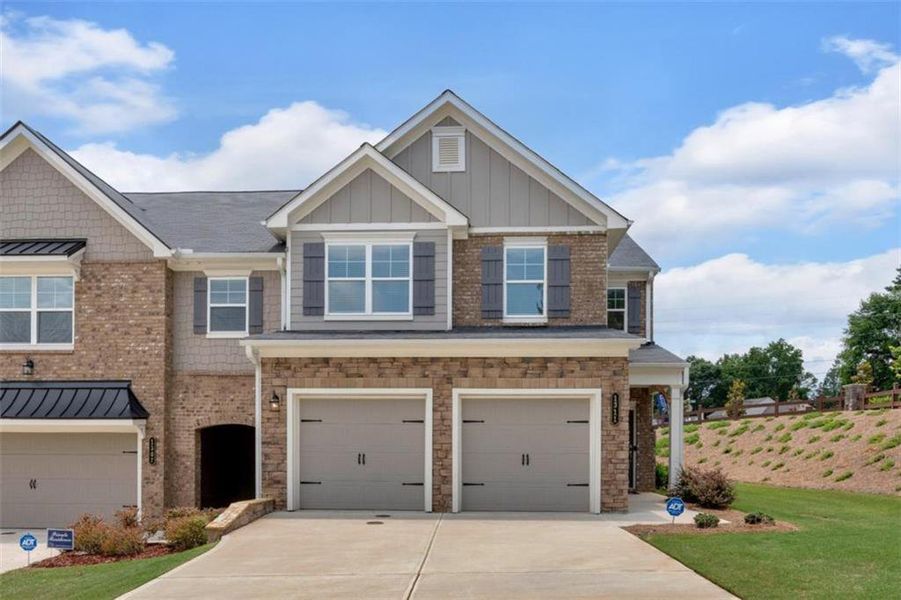 Front exterior of a new home in Park Center Pointe, Austell, GA, highlighting curb appeal (Image 1).