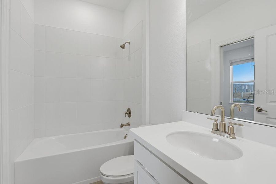 Furnished interior view inside a new home in Center Lake Ranch Community Group Page, St. Cloud (Image 14).