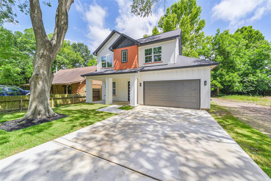 Front exterior of a new home in , Tomball, TX, highlighting curb appeal (Image 2). Front exterior of a new home in , Tomball, TX, highlighting curb appeal (Image 2).