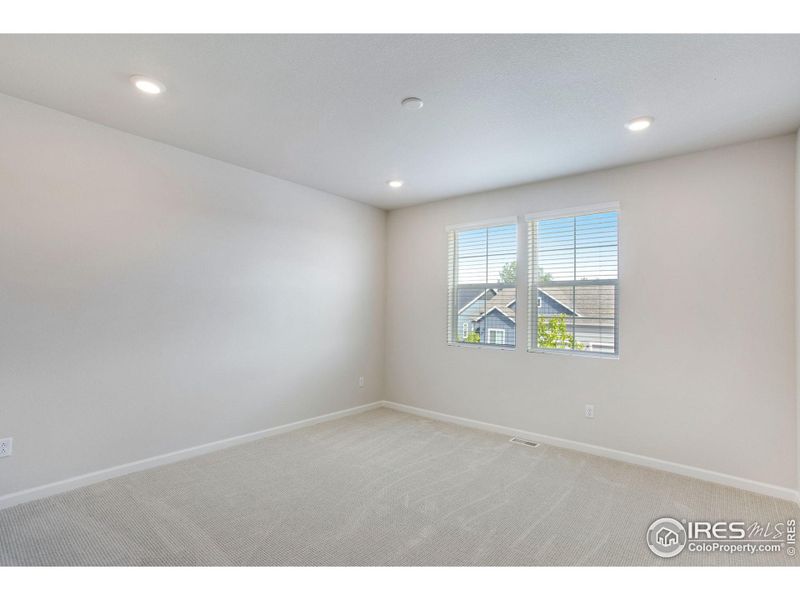 Spacious, unfurnished interior of a new home in Westside Crossing Townhomes, Berthoud (Image 15).