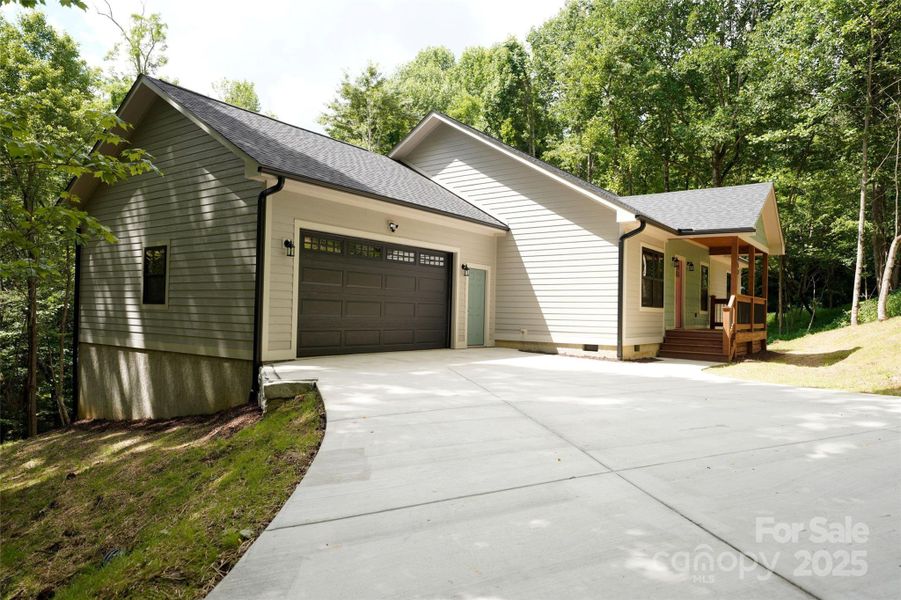 Front exterior of a new home in , Maggie Valley, NC, highlighting curb appeal (Image 18).