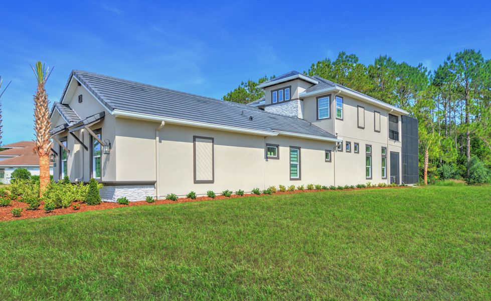 Exterior details and patio area of a home in The Conservatory at Hammock Beach, Palm Coast (Image 3).
