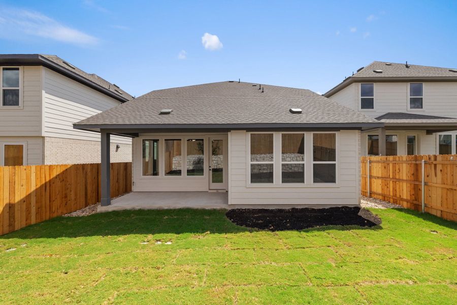 Exterior details and patio area of a home in Heritage, Dripping Springs (Image 30).