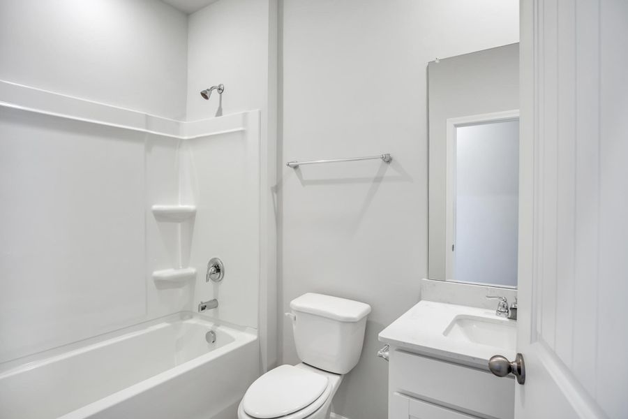 Representative furnished interior of a home built from the Jennings by D.R. Horton in Legacy Farms, White House (Image 10).
