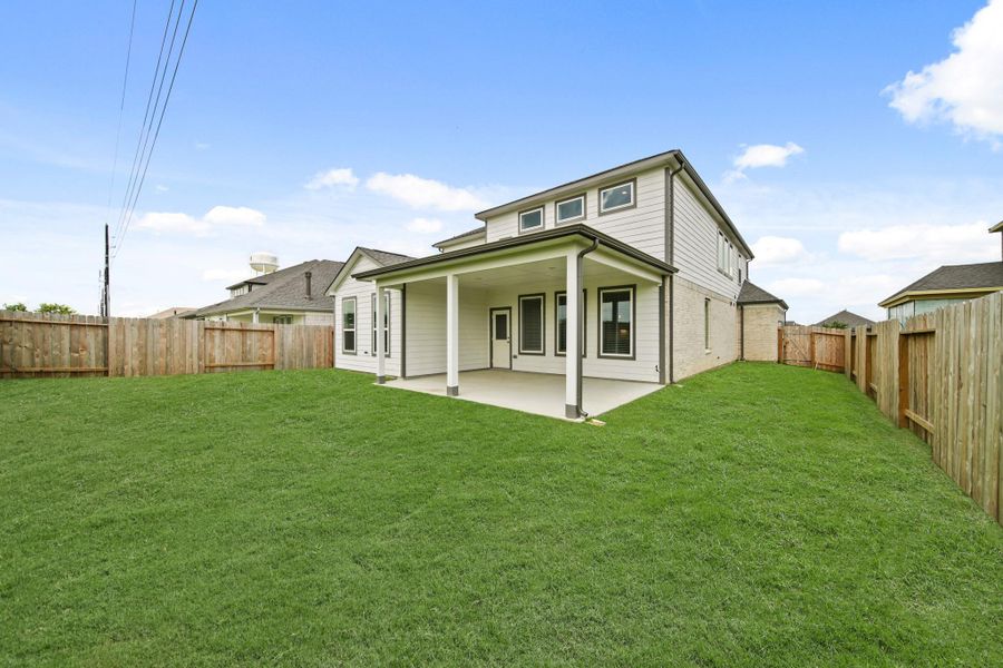 Front exterior of a new home in Beacon Hill, Waller, TX, highlighting curb appeal (Image 16). Front exterior of a new home in Beacon Hill, Waller, TX, highlighting curb appeal (Image 16).