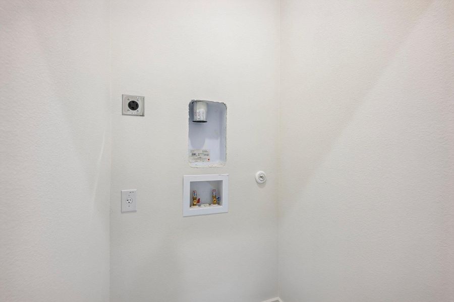 Ready for your appliances, this utility closet offers practical stackable washer/dryer hookups. Ready for your appliances, this utility closet offers practical stackable washer/dryer hookups.