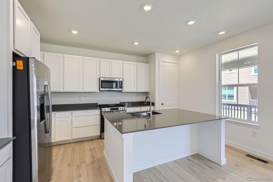 Furnished interior view inside a new home in Brighton Crossings: The Grand Collection, Brighton (Image 7).