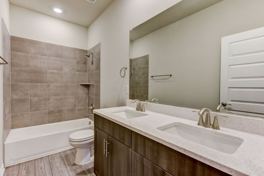 Furnished interior view inside a new home in Big Sky Ranch - Executive Collection, Dripping Springs (Image 5).